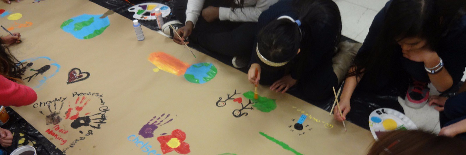 Students painting a mural